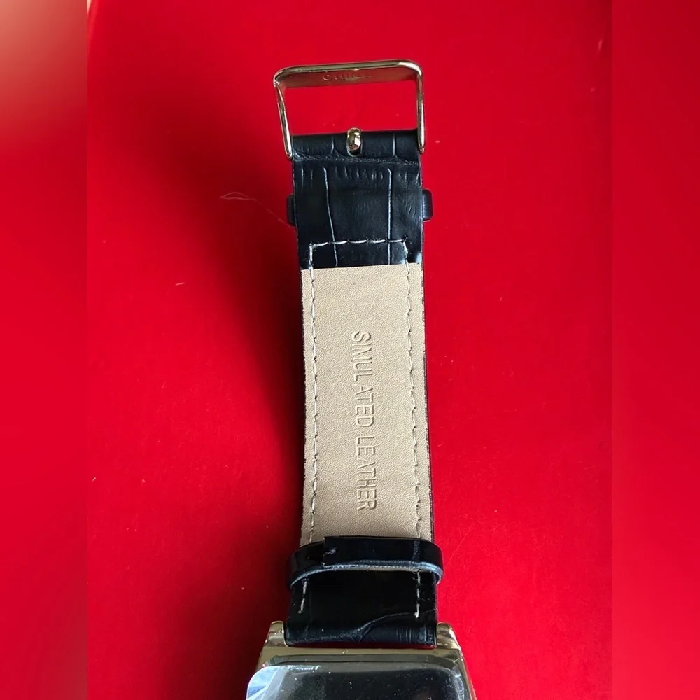 Tahari Gold and Black Men's Watch with Green Dial